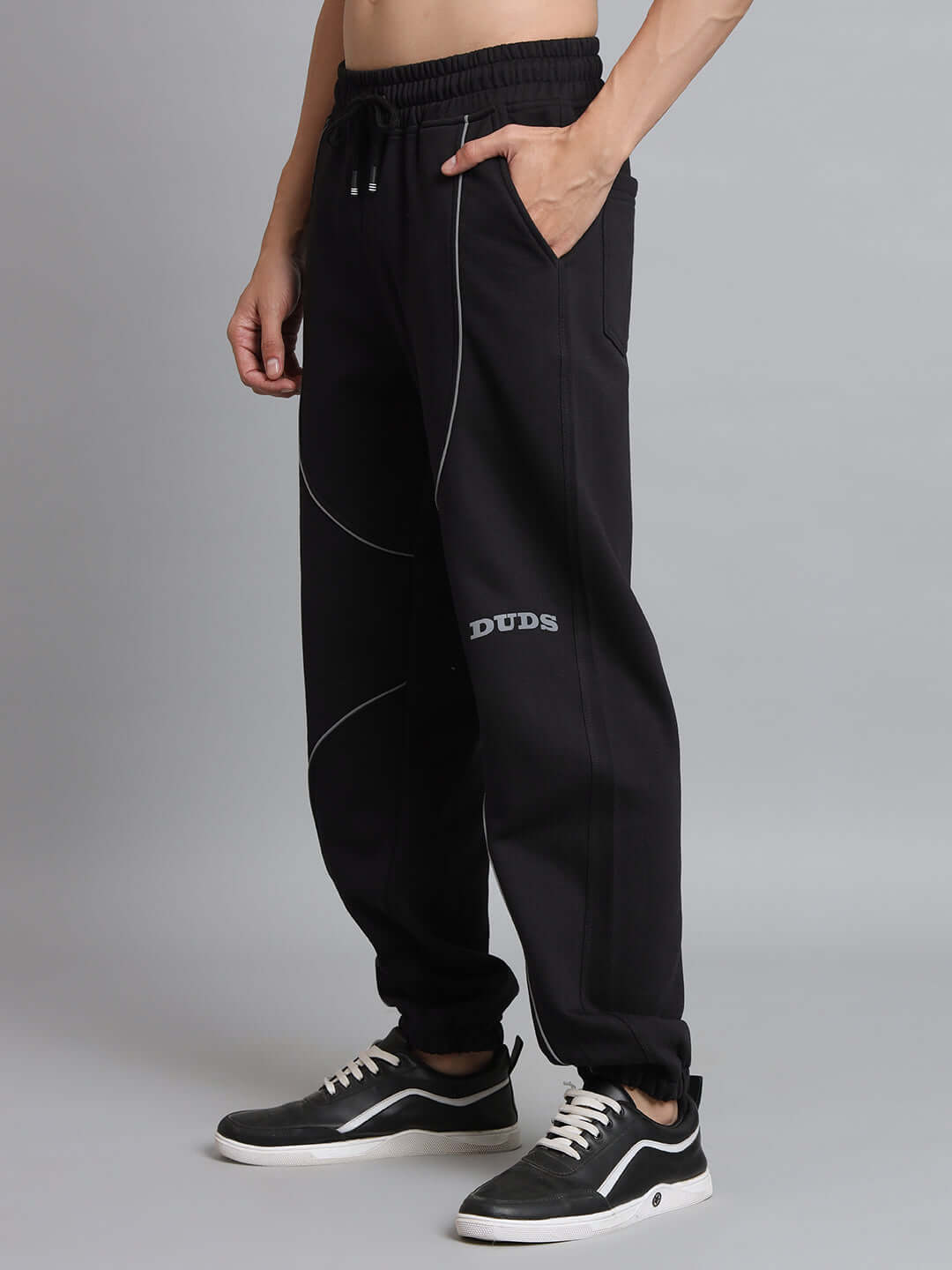 ARMOR REFLECTOR fleece jogger pants in black, featuring a comfortable fit and stylish design for versatile wear.