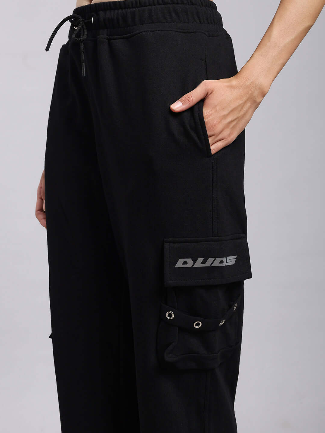 Women's DUDS Commando Joggers in black with cargo pocket details, customizable sizing option available.
