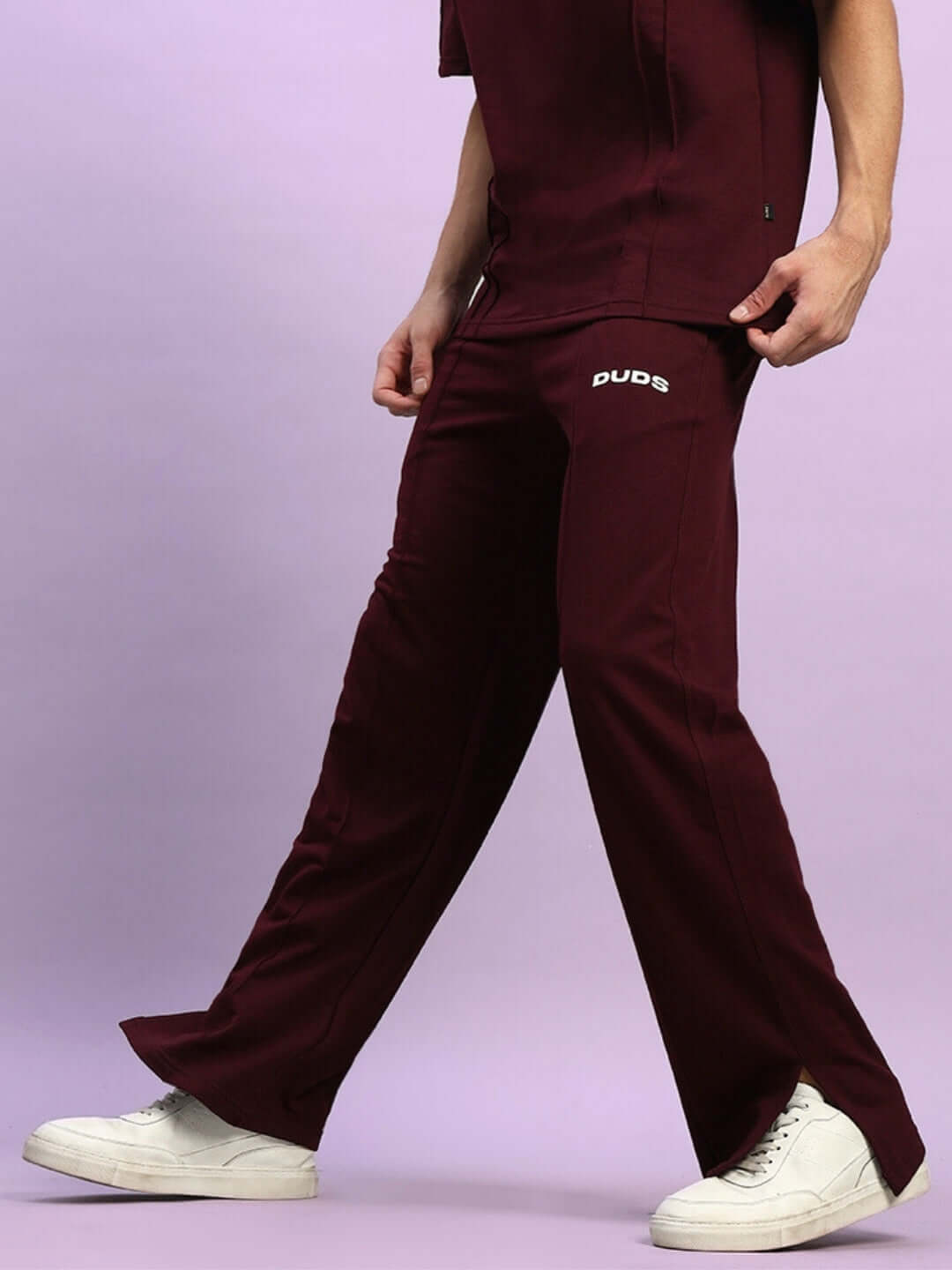 Zion Side Slit Joggers in maroon with a modern design, crafted by DUDS, featuring comfortable fit and stylish side slits for men.