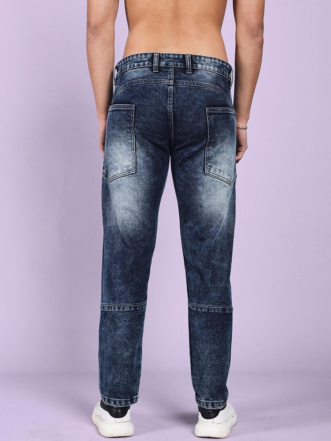 Back view of a model wearing LAPIS faded regular fit blue denim jeans, showcasing the faded detailing and comfortable fit.