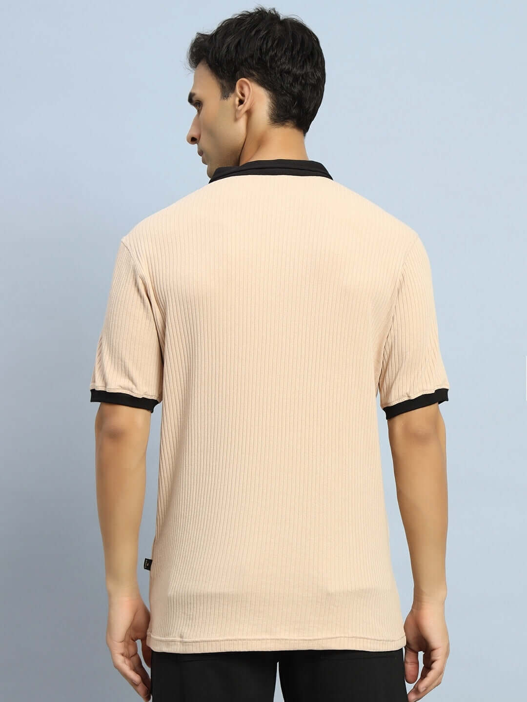 Back view of FILIPINO REGULAR FIT T-SHIRT BEIGE with half sleeves, worn by a model showing the regular fit and beige color.