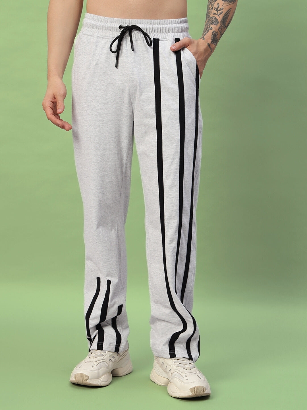 BASTILLE JOGGER in Melange Grey with black stripe design, shown worn with white sneakers. Made to order by DUDS.