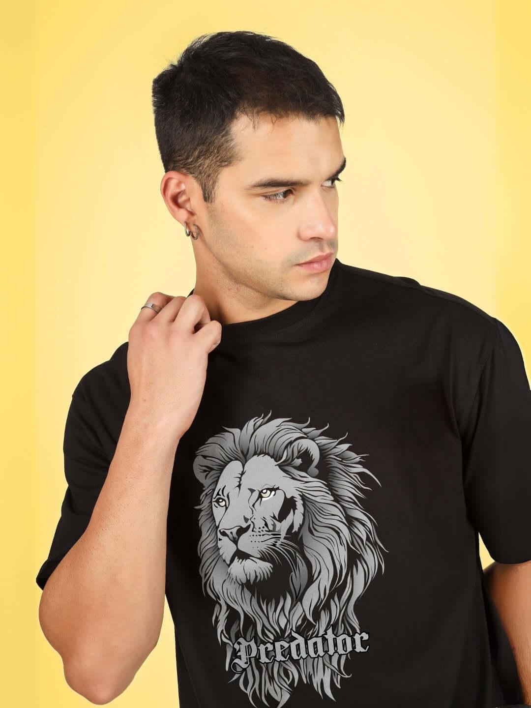 Man wearing a black PREDATOR LEGND printed summer co-ord set featuring a lion design. Premium cotton blend. Stylish and comfortable.