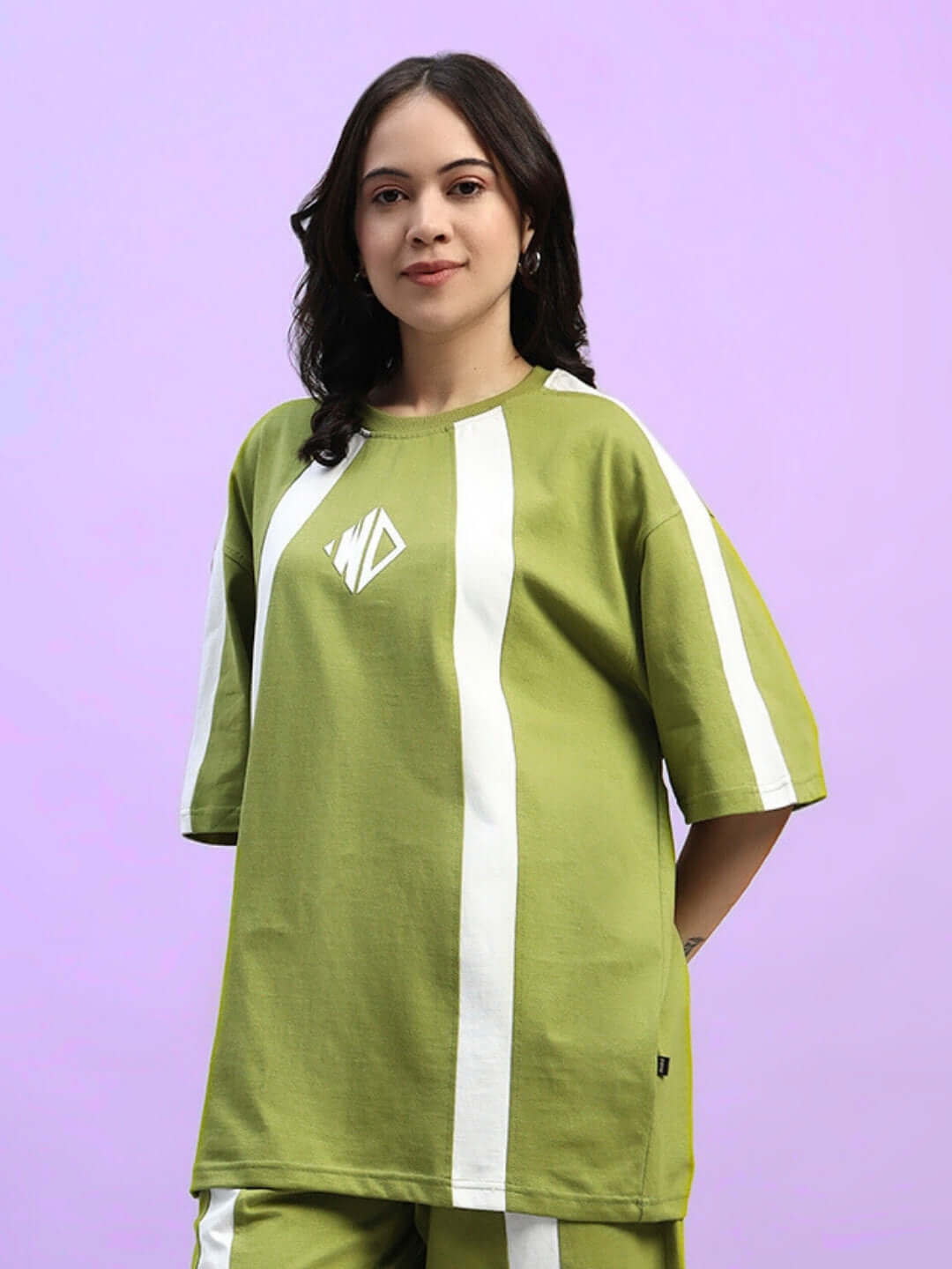 Olive green oversized women's T-shirt, premium cotton fabric, showcasing a stylish design with white stripes. Ideal for casual wear.