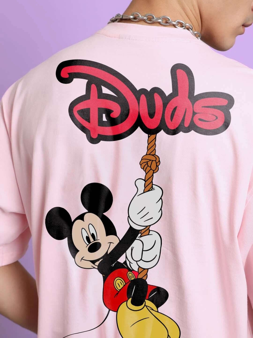 DUDS MOUSE OVER-SIZED T-SHIRT PINK with cartoon graphics on the back, showcasing a fun and casual style for everyday wear.