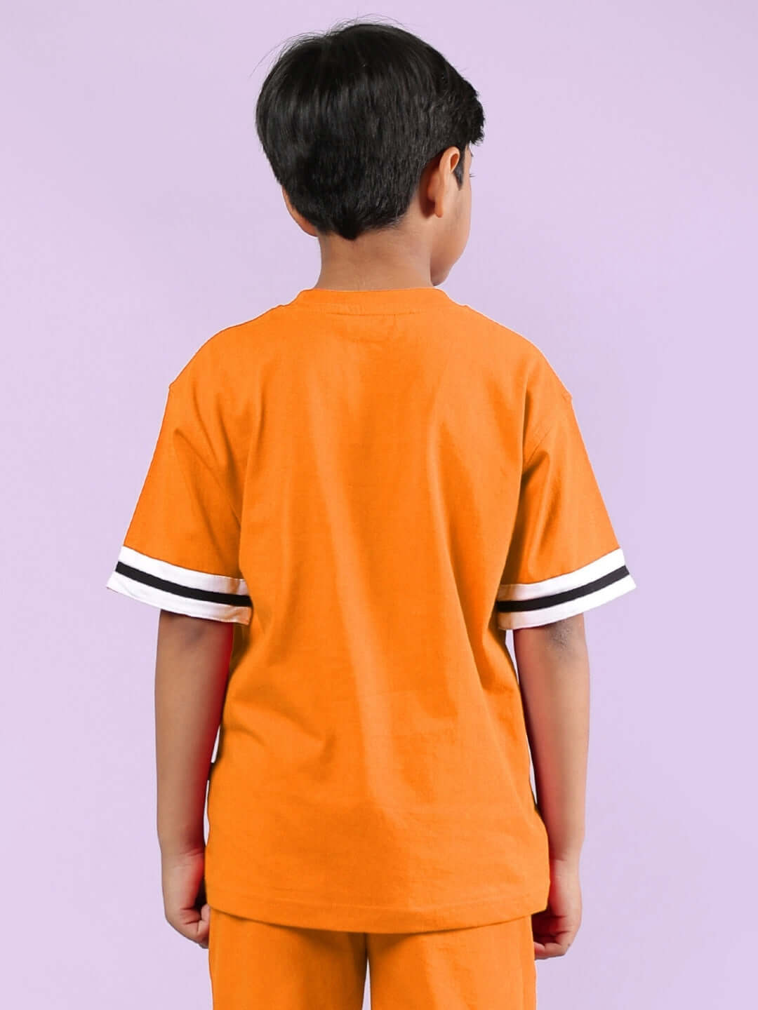 Back view of Chicago printed orange t-shirt for boys and girls by DUDS, showcasing the vibrant color and sleeve design.