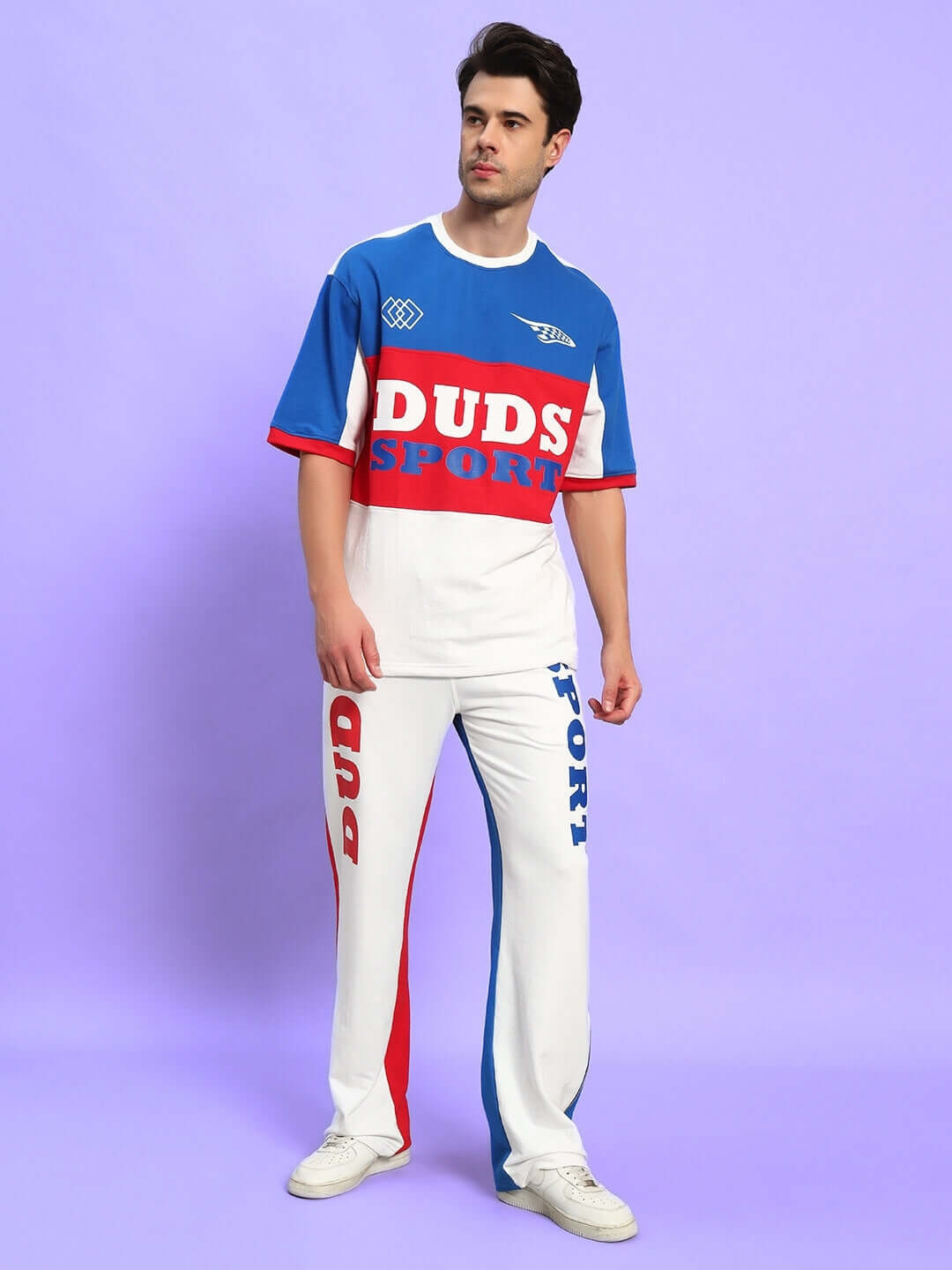 Model wearing Urban Drift Relaxed Fit Co-Ord Set in multi-color, featuring premium cotton French terry fabric and sporty design.
