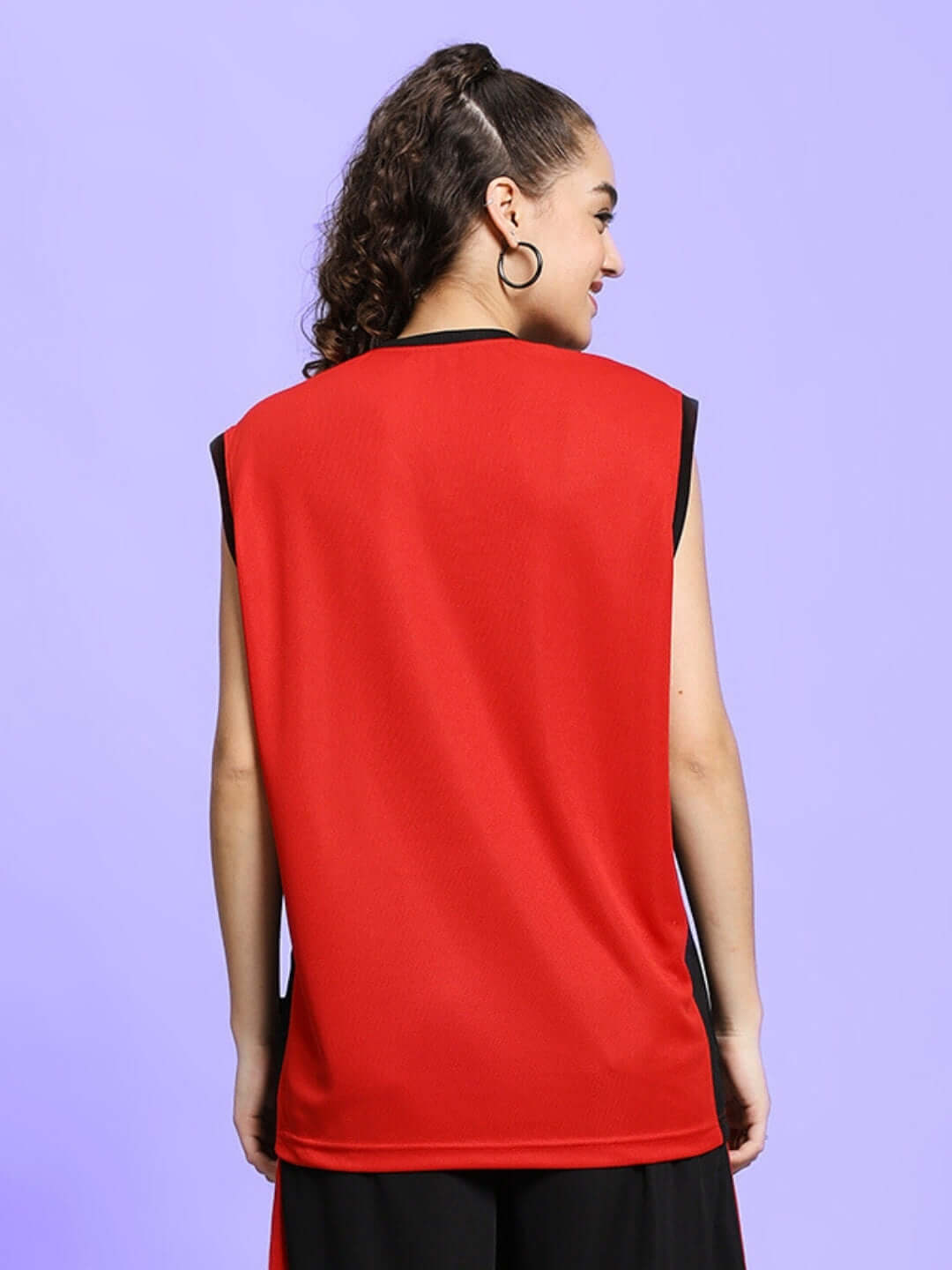 Back view of WOMEN'S PORTIA GYM T-SHIRT in red, sleeveless design, custom fit available, worn by a model with long hair.