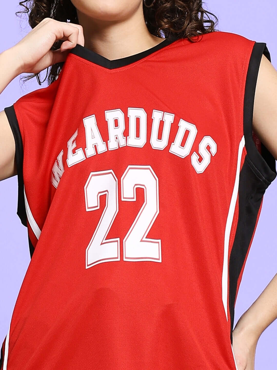 Woman wearing red Wearduds gym t-shirt with number 22, showing custom fit options for personalized sizing.