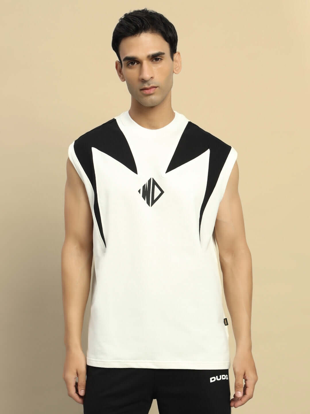 Model wearing DINO THUNDER over-sized t-shirt in off white with black graphic design, made from premium cotton French Terry.