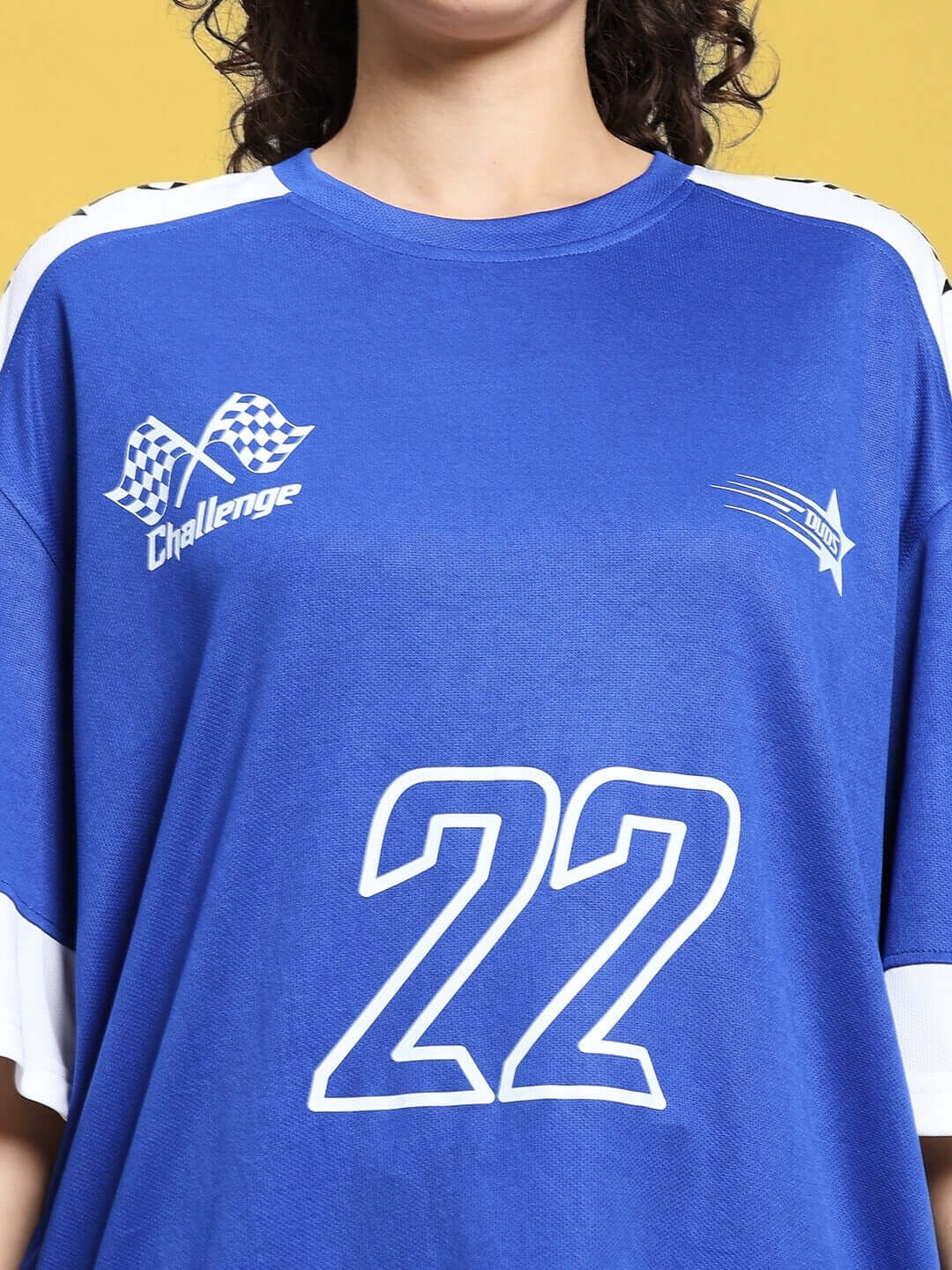 Close-up of Women's Challenge Colorblock Co-Ord Set in royal blue, featuring sports polyester fabric and number 22 design.