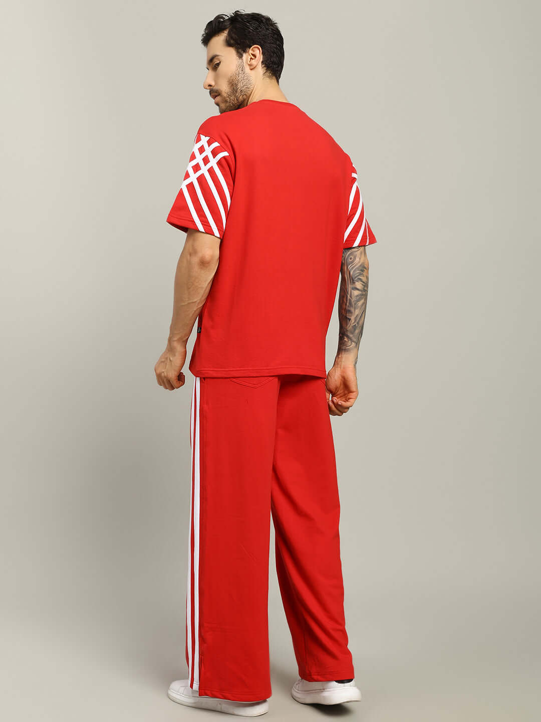 Red United Stripe Co-ord Set in premium cotton terry featuring white stripes, ideal for casual wear, made in India. Cold wash recommended.