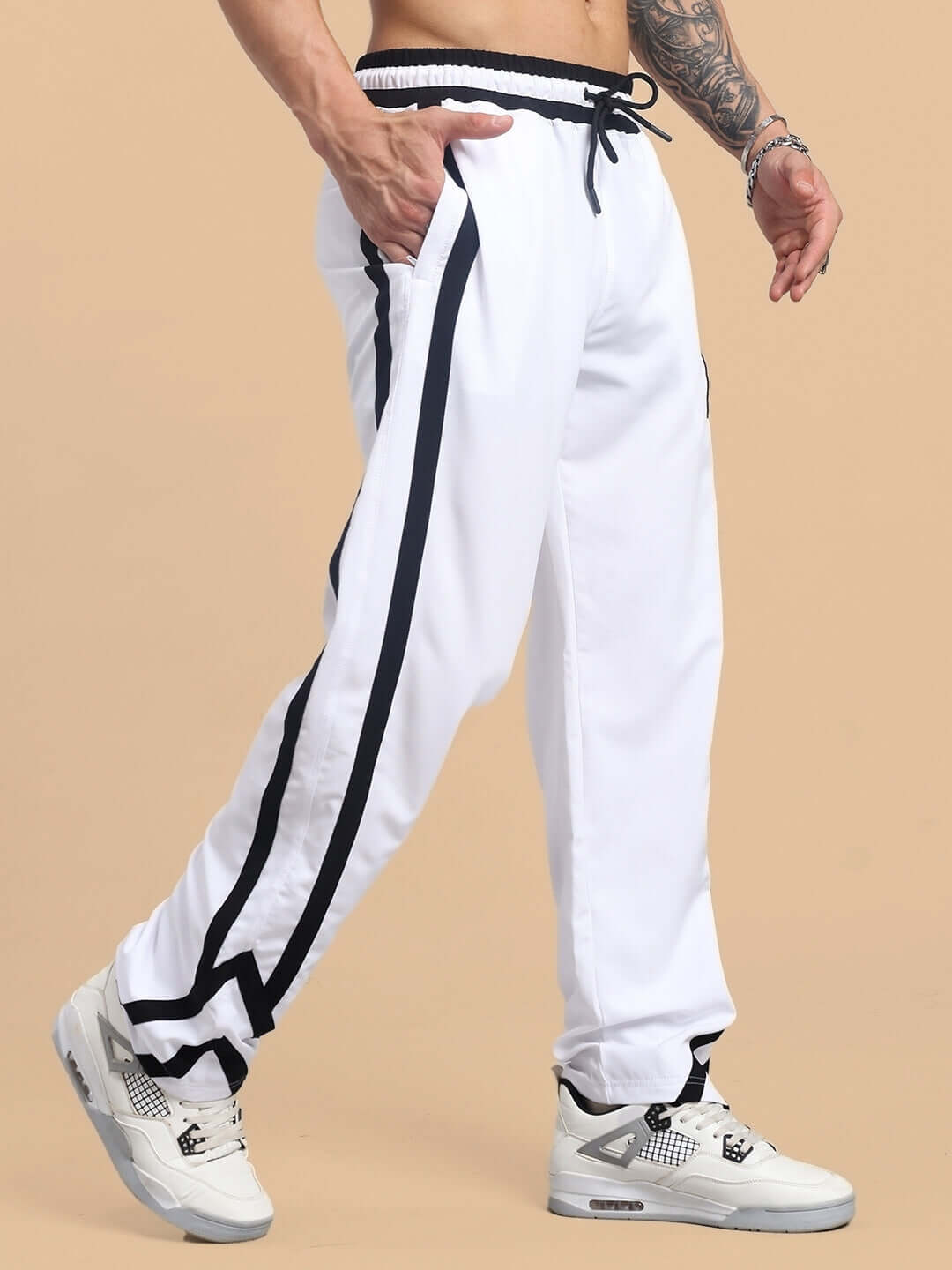 FRIZZLE Relaxed Fit Jogger in white, featuring black stripes and a drawstring waist, made to order by DUDS experienced tailors.