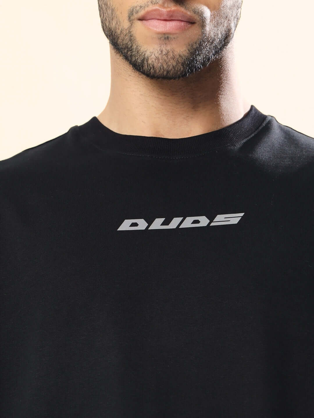 SCORPIO ZODIAC LONGLINE OVER-SIZED T-SHIRT BLACK worn by model showcasing front design.