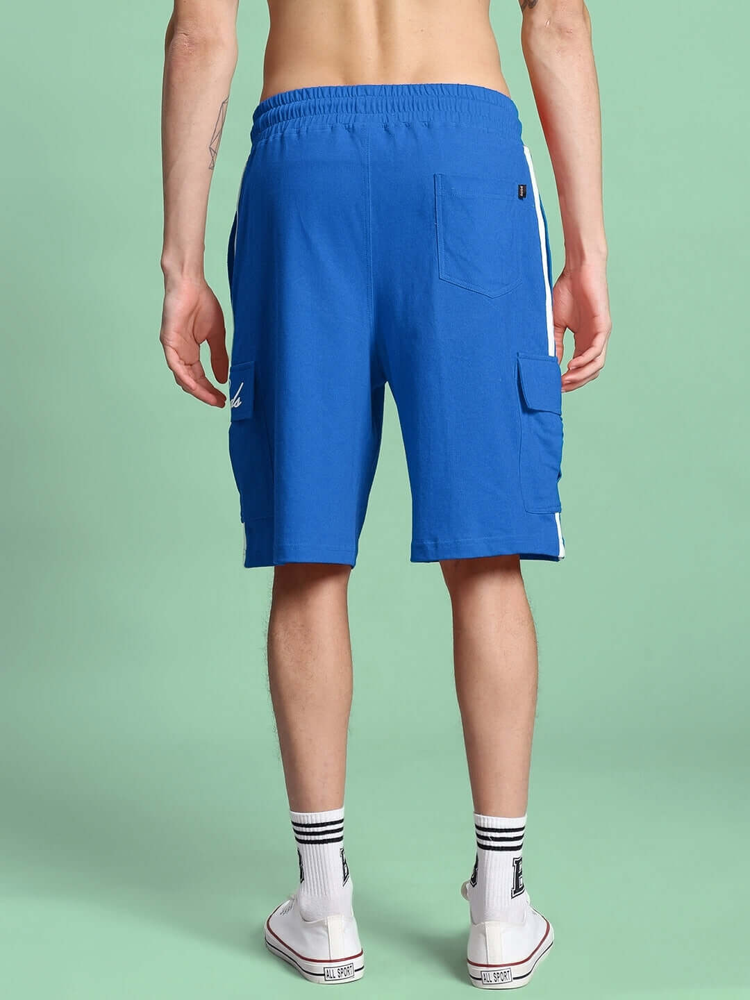 Back view of blue SCOTIA regular fit shorts, featuring a comfortable elastic waistband and practical pockets, available with custom fit option.