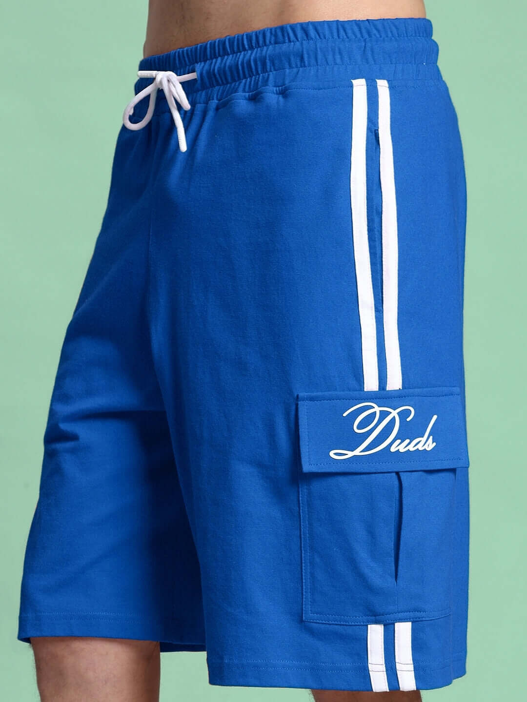 SCOTIA regular fit blue shorts with white stripes and Duds logo, featuring elastic waistband, side pocket, available in custom fit options.
