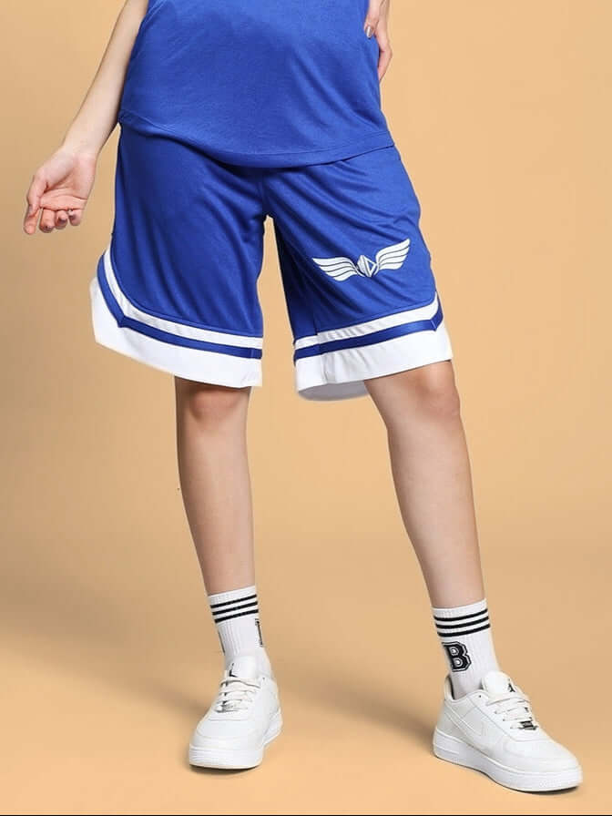 Model wearing WOMEN'S WD WINGS Royal Blue Regular Fit Shorts, featuring sporty stripes and logo, perfect for casual and athletic wear.