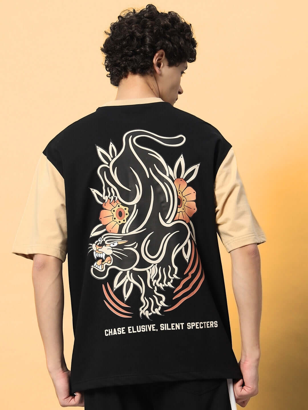 PHANTOM OVER-SIZED T-SHIRT BLACK BEIGE with bold graphic and beige sleeves, perfect for streetwear style statement.