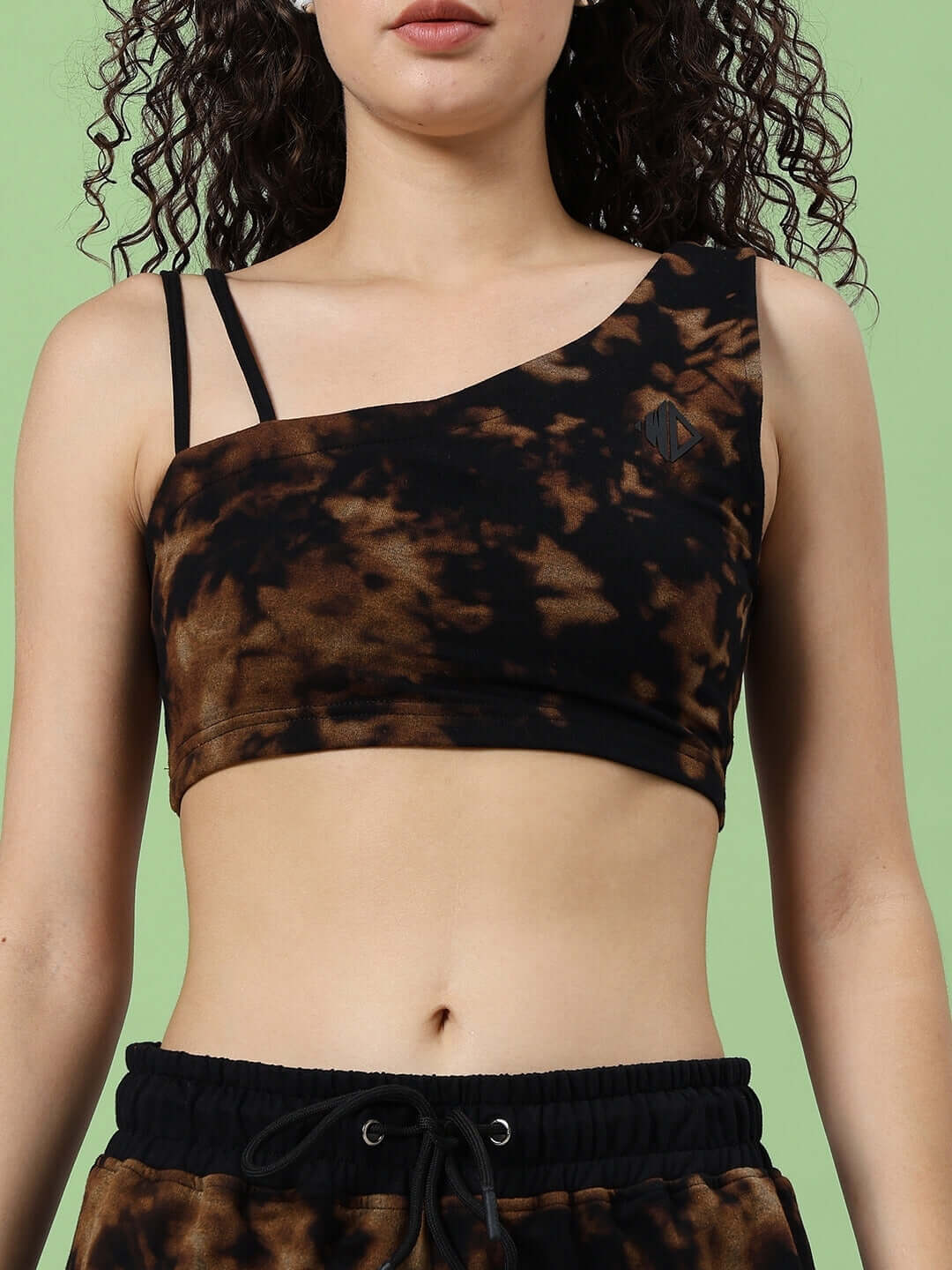 Women's black tie-dye co-ord set featuring a premium cotton crop top and matching pants, stylishly designed for comfort and fashion.