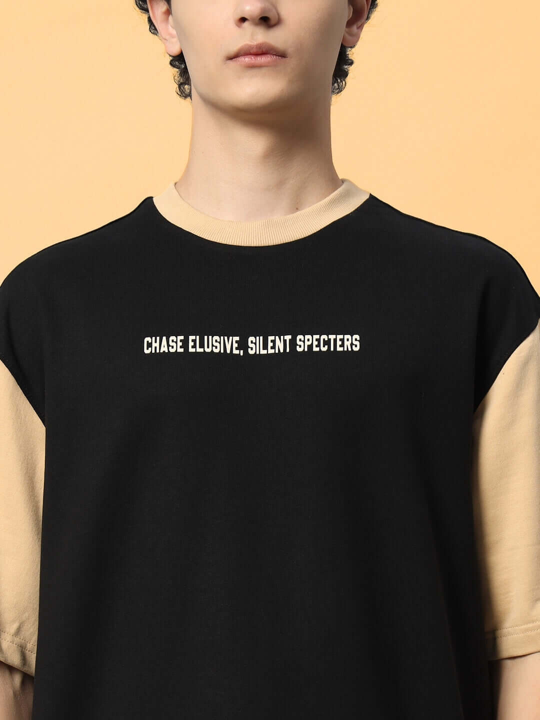 PHANTOM OVER-SIZED T-SHIRT BLACK BEIGE with "Chase Elusive, Silent Specters" print.
