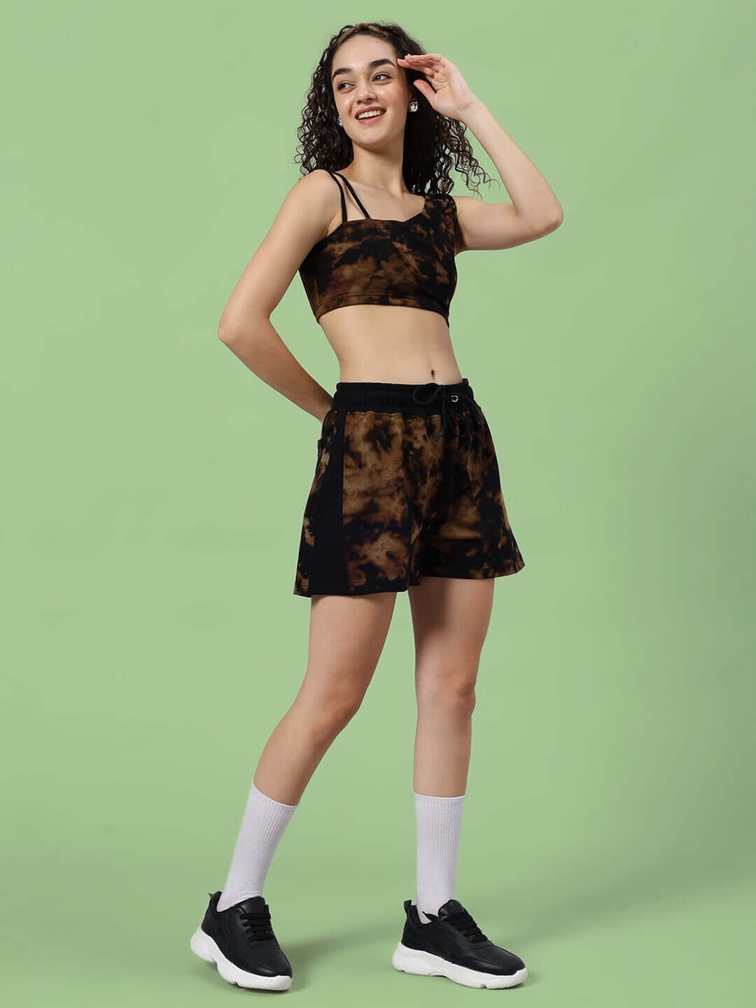 Model wearing women's black tie-dye co-ord set made of premium cotton terry lycra, showcasing stylish summer apparel.