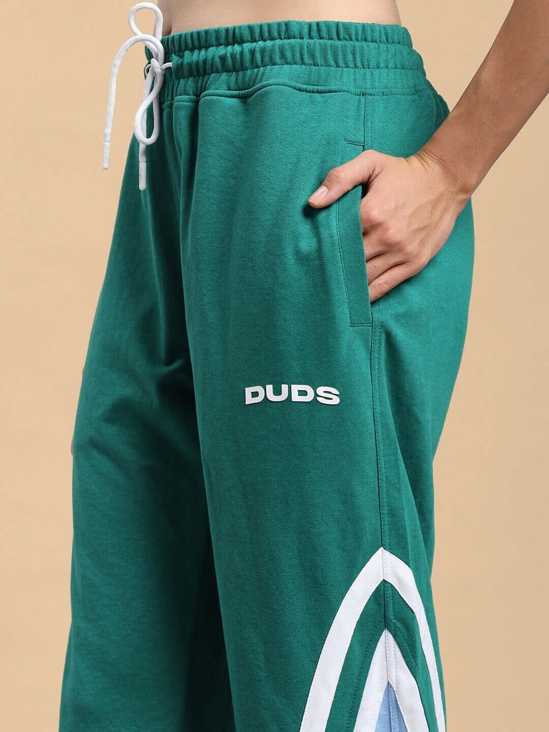 Teal green women's Rio One relaxed fit joggers by DUDS with side pocket detail.