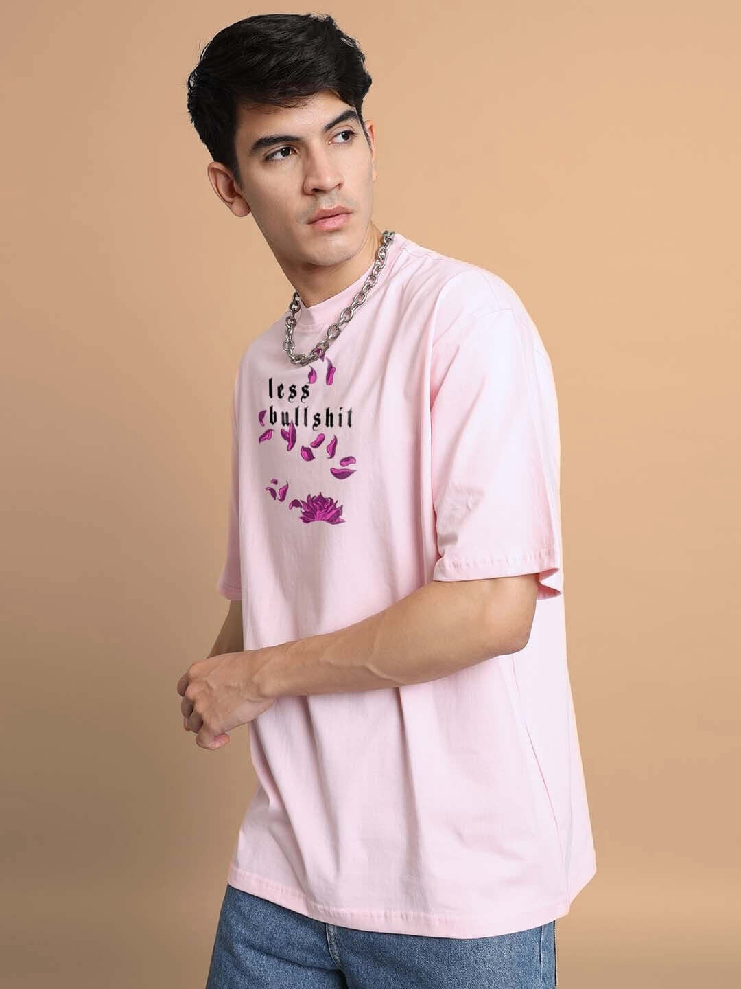 Man wearing MOANING TIGRESS OVER-SIZED T-SHIRT PINK with casual style.