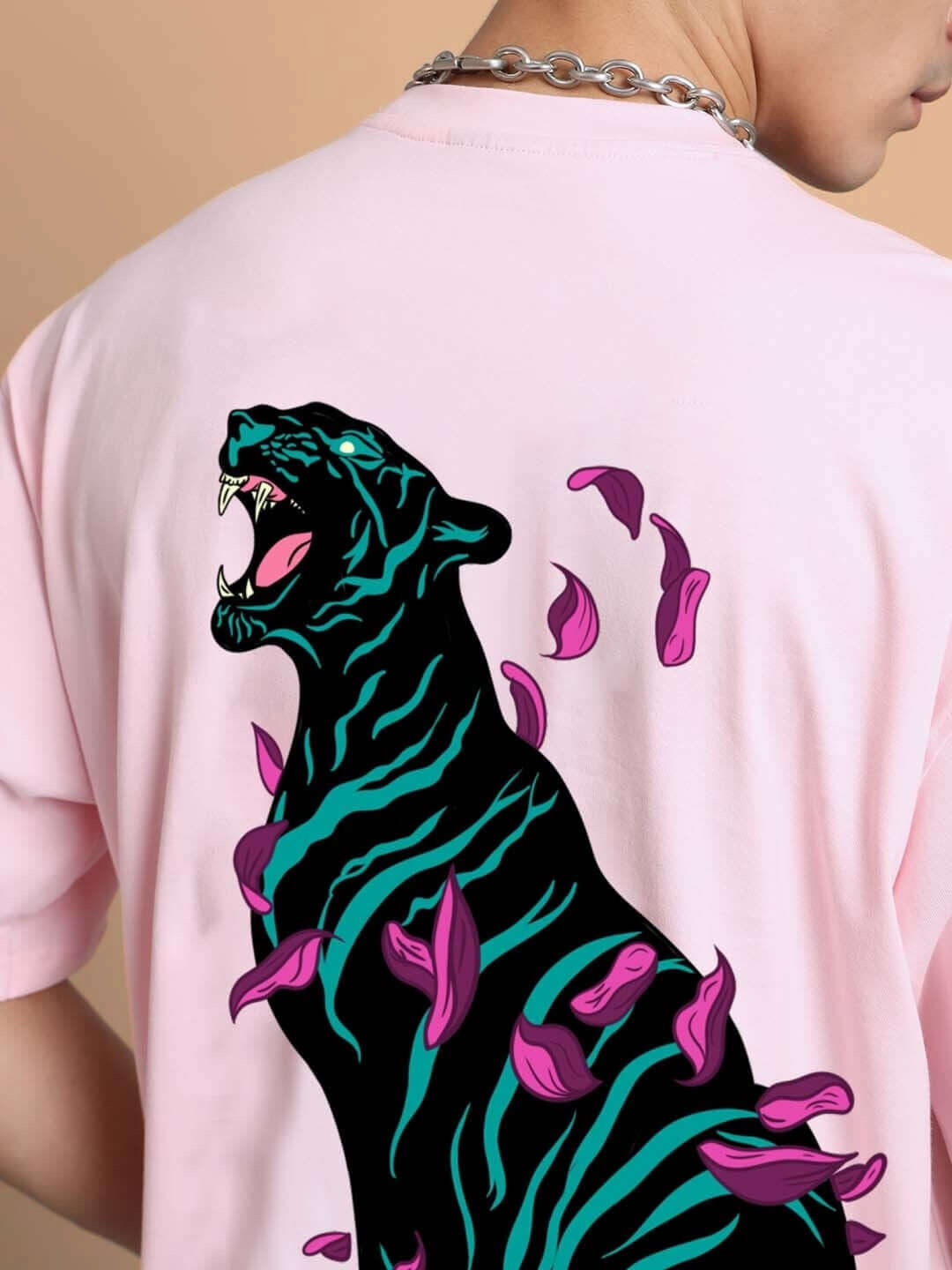 MOANING TIGRESS OVER-SIZED T-SHIRT PINK featuring bold tiger design and pink petal detailing, rear view close-up.
