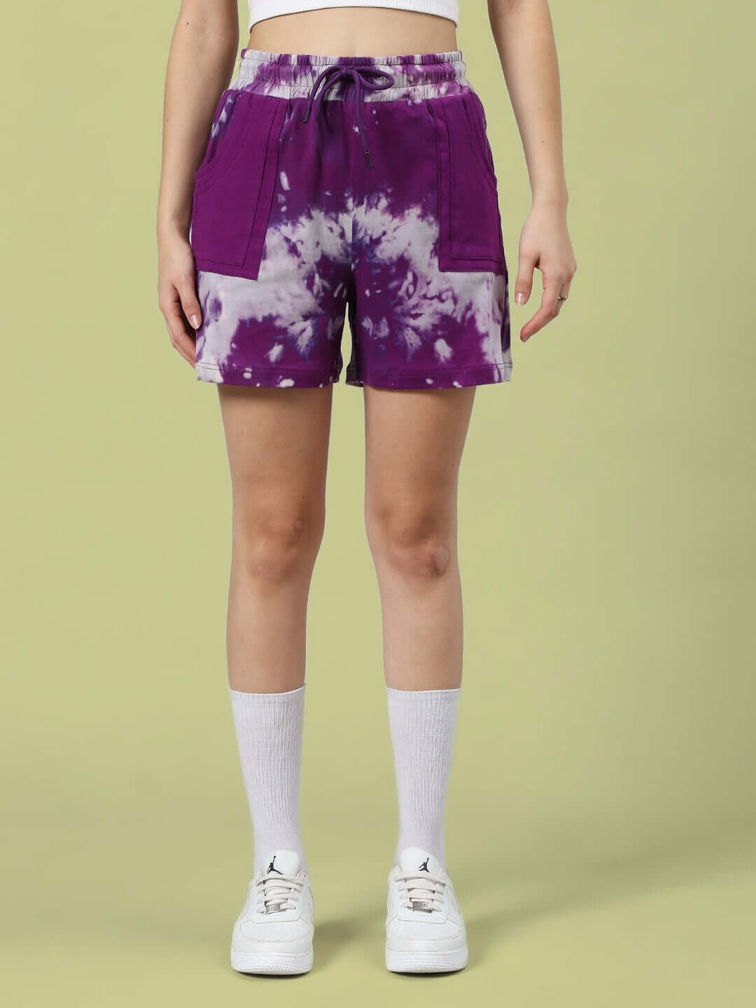 Model wearing WOMEN'S JAMBUL TIE-DYE CO-ORD SET shorts in purple with drawstring waist, showcasing premium cotton fabric.