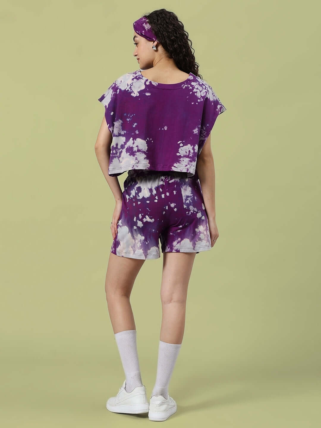 Model wearing purple tie-dye co-ord set with headband, featuring premium cotton fabric for a stylish and comfortable look.
