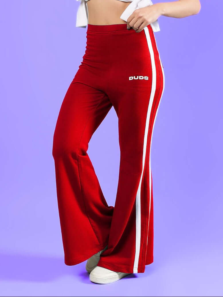 WOMENS FITTONIA COOL WIDE FLARE JOGGERS RED showcasing a stylish wide-flare silhouette in vibrant red.
