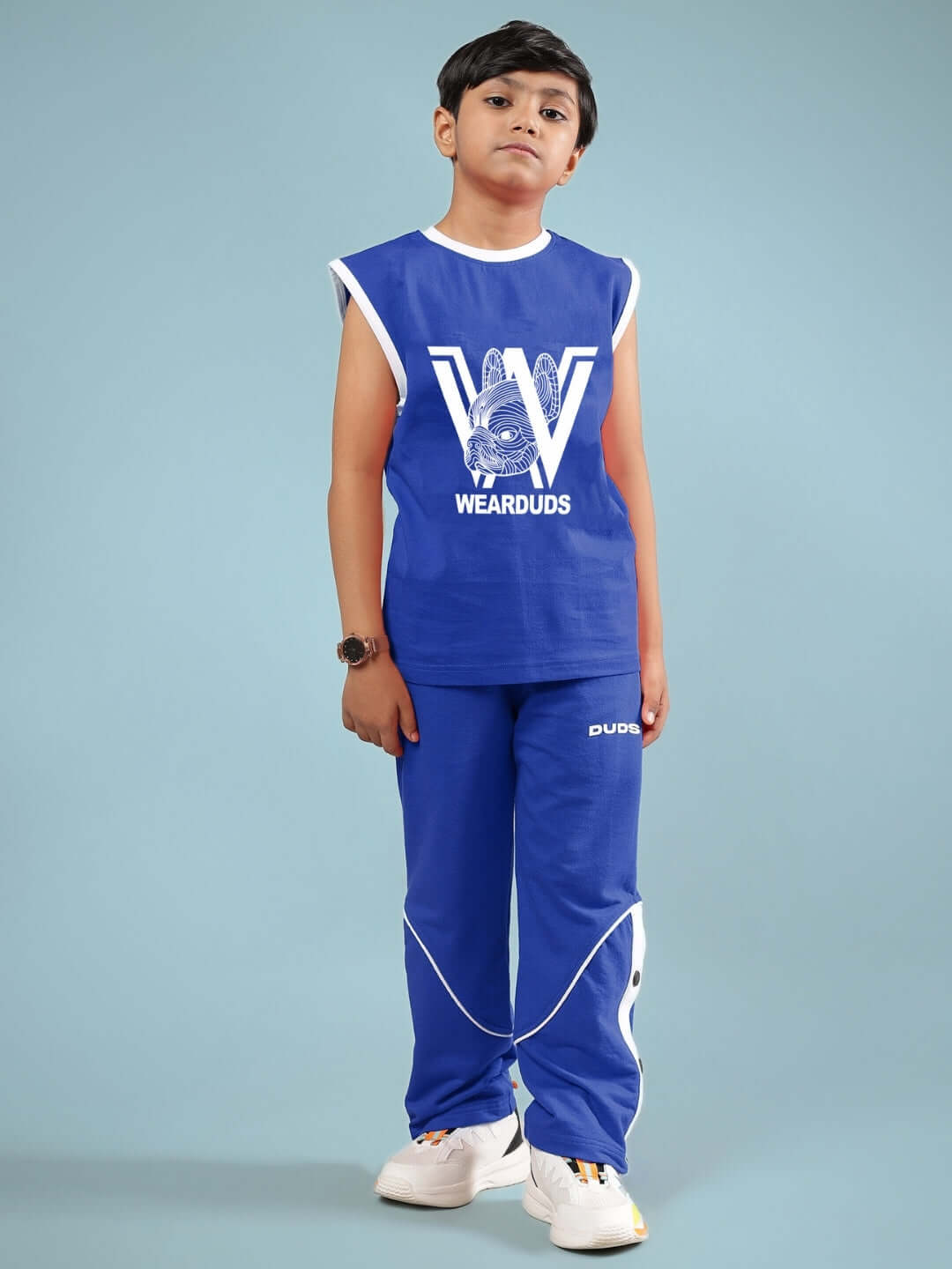 Boy wearing Washington Huskies blue co-ord set from DUDS, featuring sleeveless top and matching pants, suitable for boys and girls.
