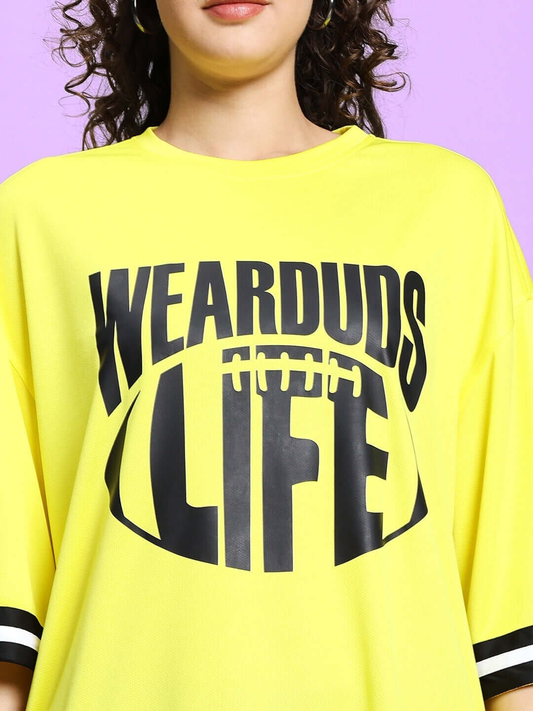 Yellow oversized women's t-shirt with bold 'WEARDUDS LIFE' graphic, ideal for a casual and stylish look. Perfect for custom fit.