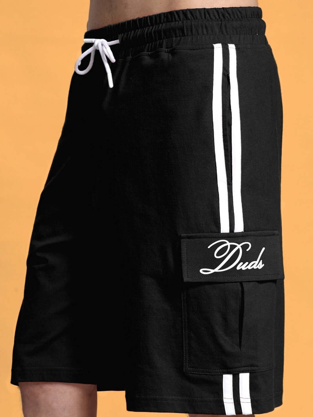 Black Scotia Regular Fit Shorts by Duds with white stripes and adjustable drawstring for a customizable fit.