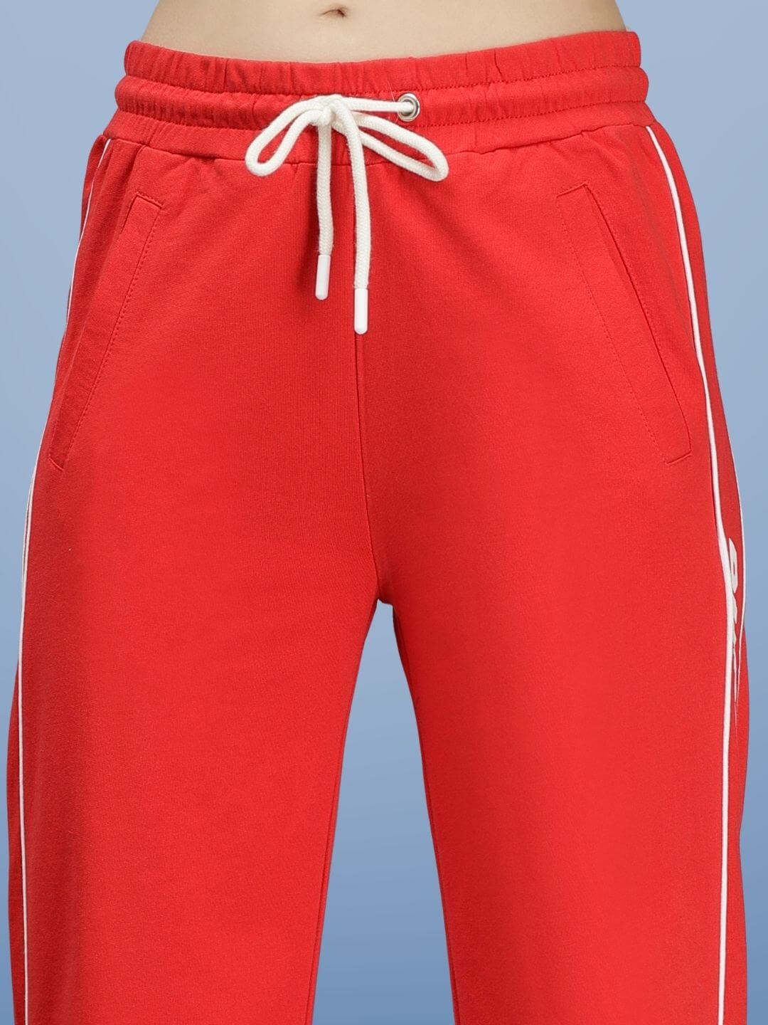 WEARDUDS RIO RELAXED FIT JOGGERS RED with white piping, handmade by experienced tailors, shown on a model, front view.