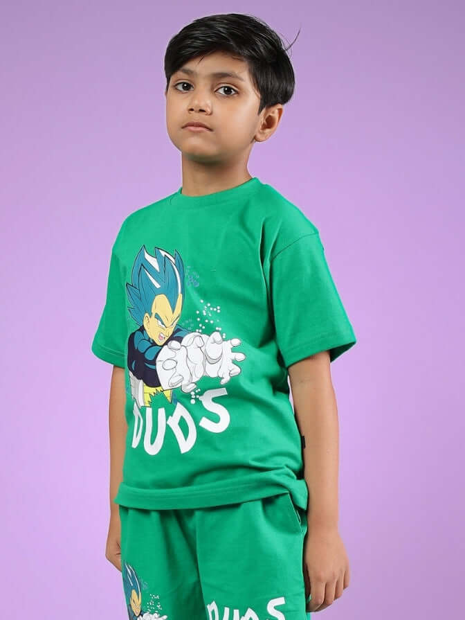 Child wearing green Satoru t-shirt featuring cartoon graphic, designed for boys and girls; available for custom fit orders at DUDS.