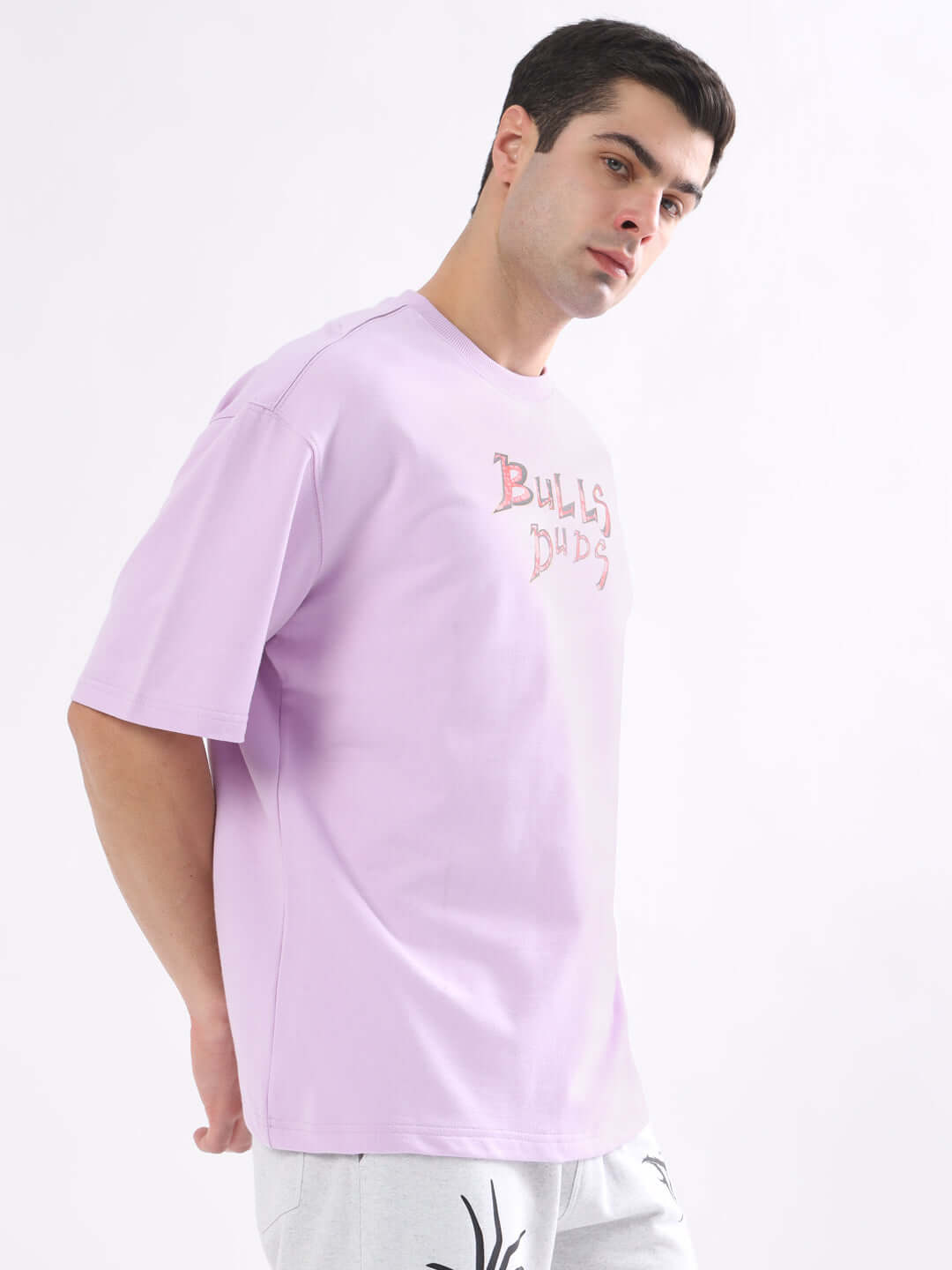 Model wearing Wild Bull Over-Sized T-Shirt Lavender showcasing streetwear style in soothing lavender shade.