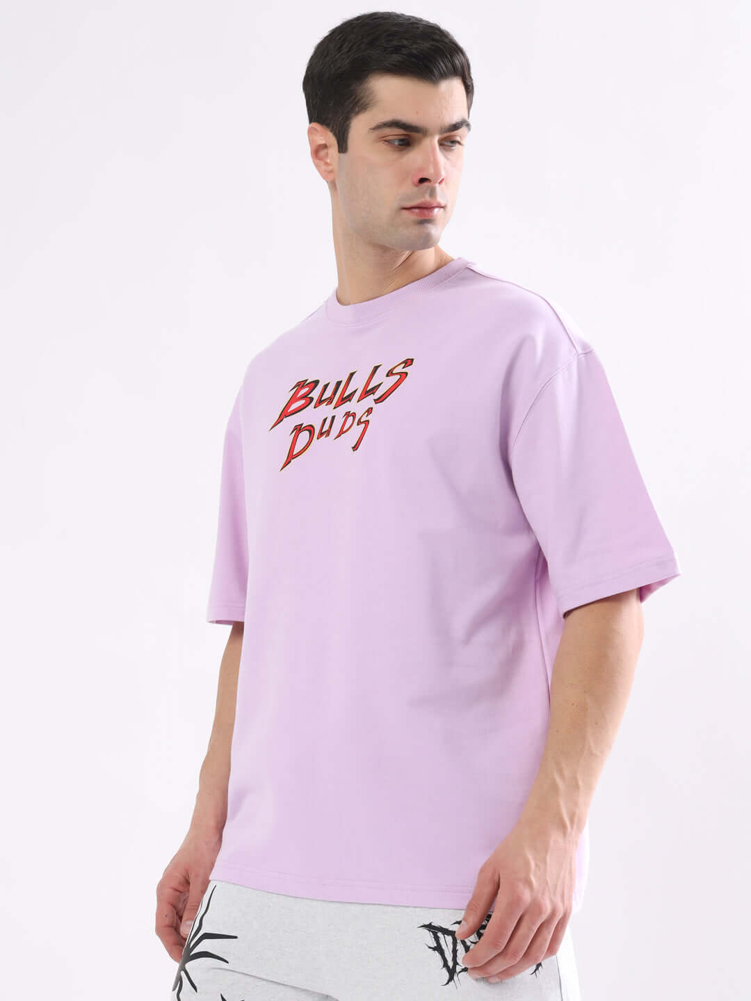 Model wearing Wild Bull Over-Sized T-Shirt Lavender in lavender color, showcasing bold streetwear style.
