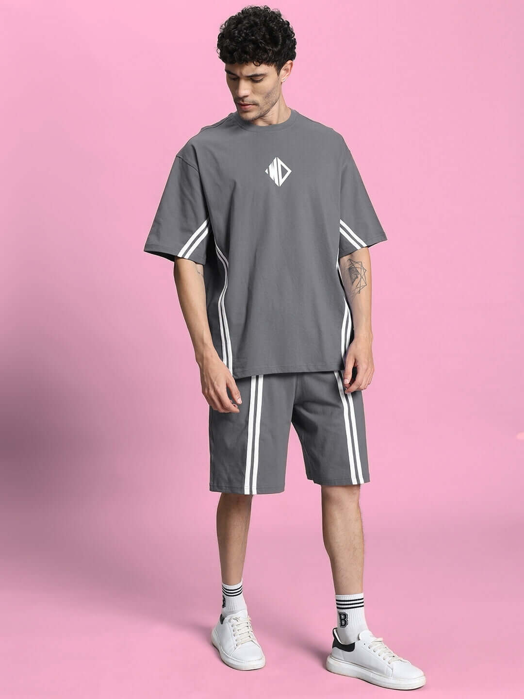 Model wearing grey Outlook Summer Co-ord Shorts Set with white stripes, premium cotton French Terry Lycra, perfect for casual wear.