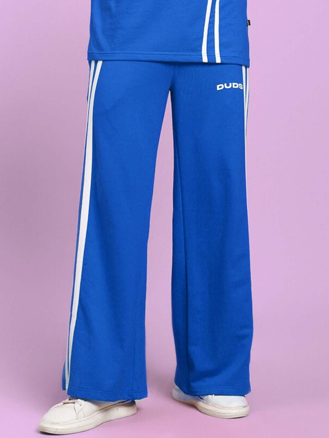 Blue joggers with white stripes from DUDS, featuring a custom fit option for personalized sizing, made with quality craftsmanship.