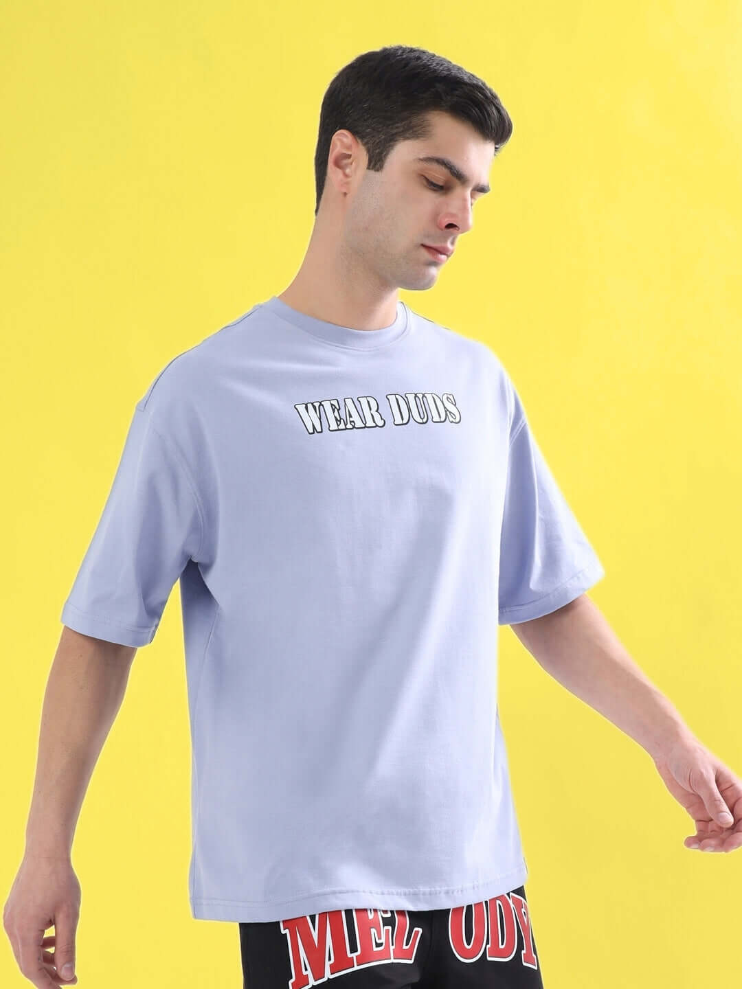 Man wearing RAPPER BUNNY OVER-SIZED T-SHIRT LILAC, 100% cotton, 200 GSM bio-washed, premium heavy gauge fabric, front design view.