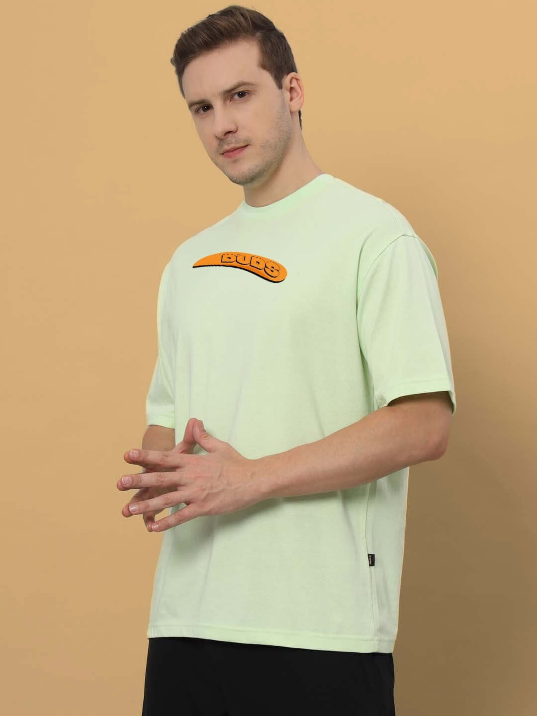 GARFIELD OVER-SIZED T-SHIRT CELERY ICE in premium heavy gauge fabric, featuring 100% cotton 200 GSM bio-washed material.