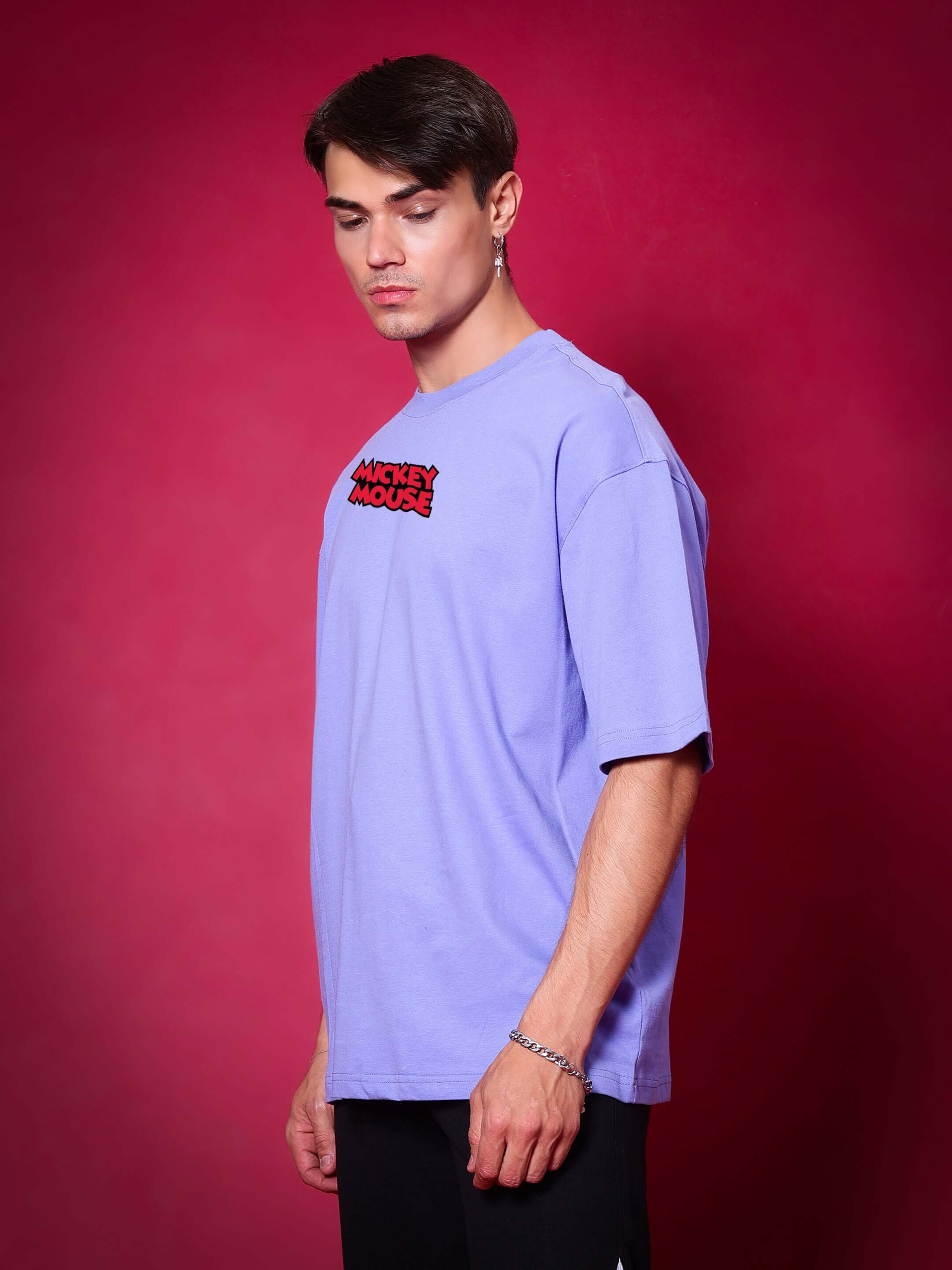 Model wearing DUDS MOUSE OVER-SIZED T-SHIRT PERIWINKLE against a pink background.