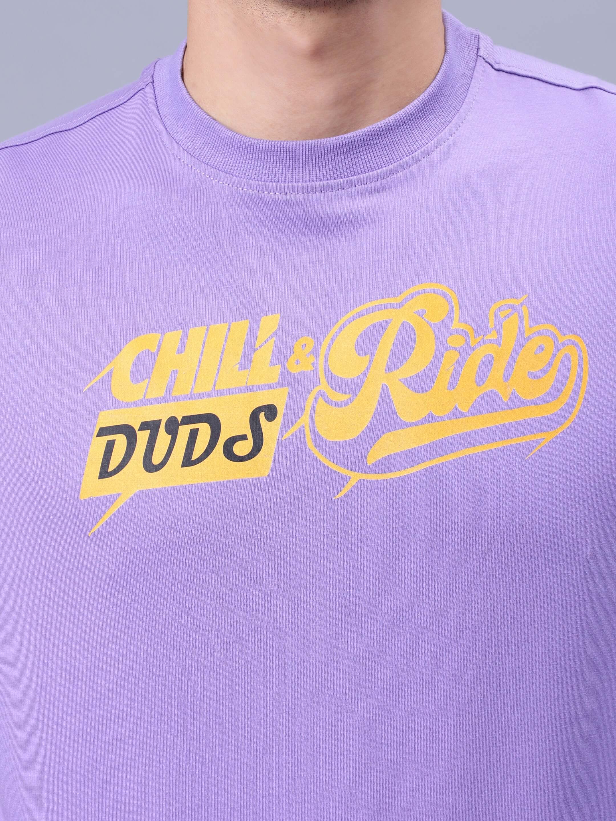 DUDS CHILL & RIDE OVER-SIZED T-SHIRT LAVENDER with bold yellow graphic text on chest