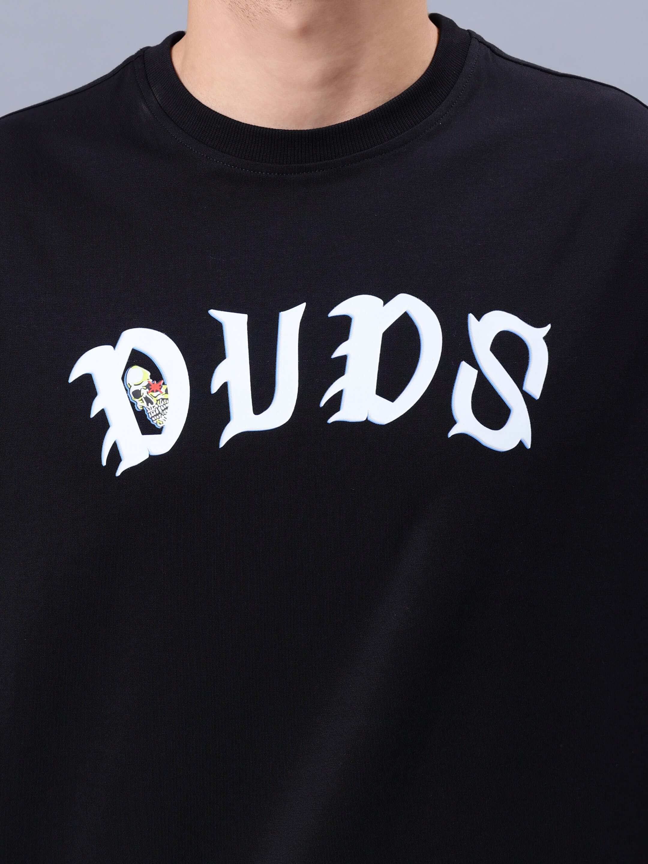 REBELS WTF OVER-SIZED T-SHIRT BLACK by DUDS, featuring bold white lettering.
