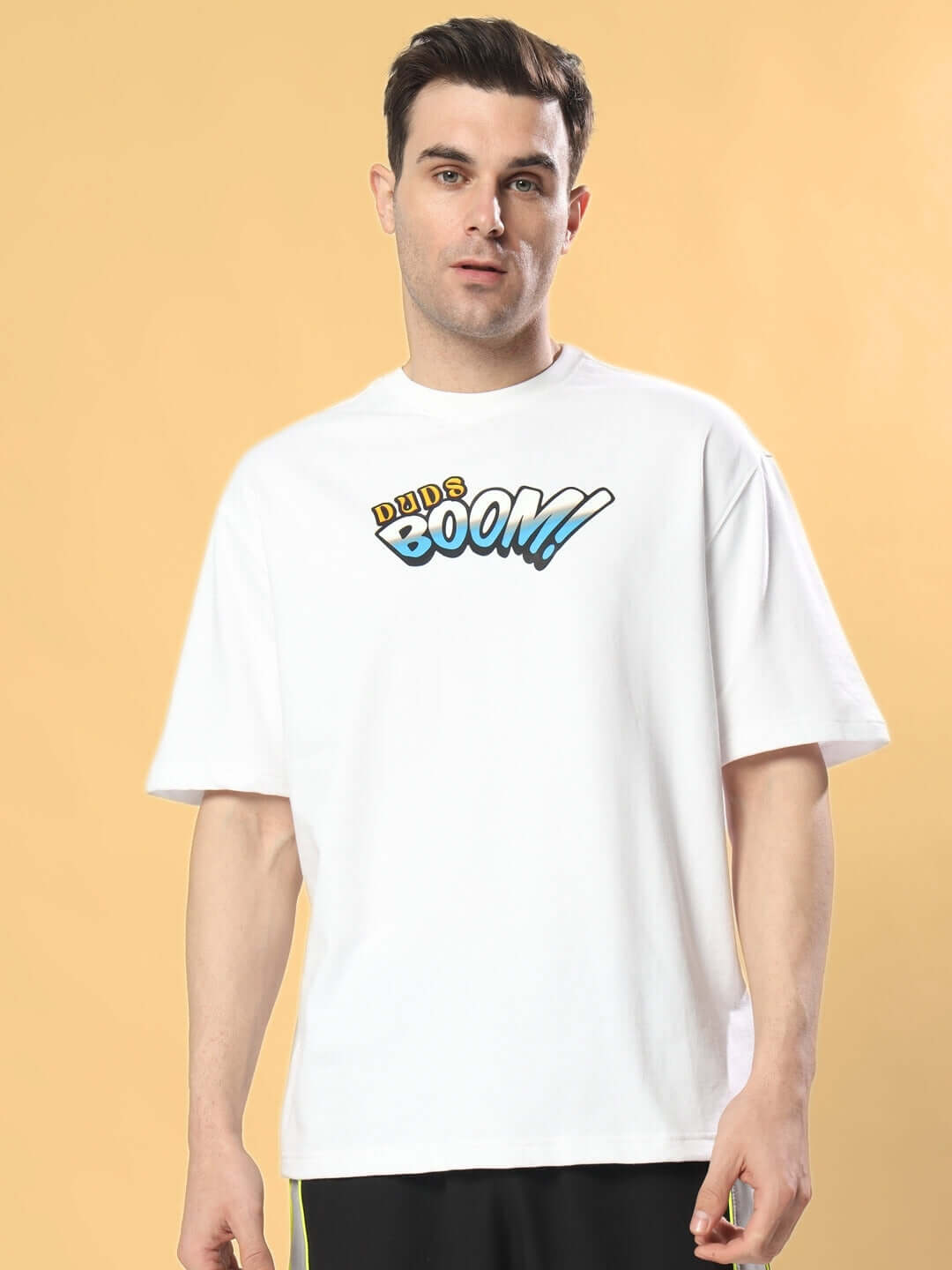 Man wearing BOOM BUNNY OVER-SIZED T-SHIRT WHITE with graphic print, premium cotton fabric.