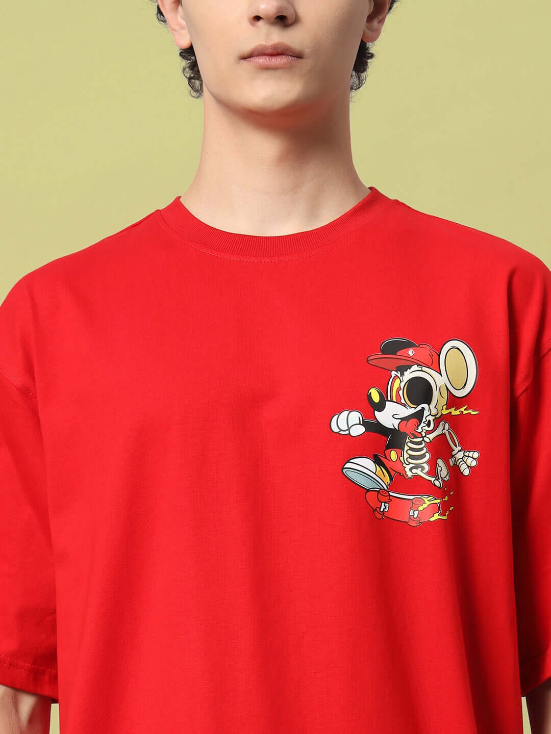 Red MICKEY COTTON OVER-SIZED T-SHIRT featuring a cartoon design on the front, available with a customizable fit for a personalized style.