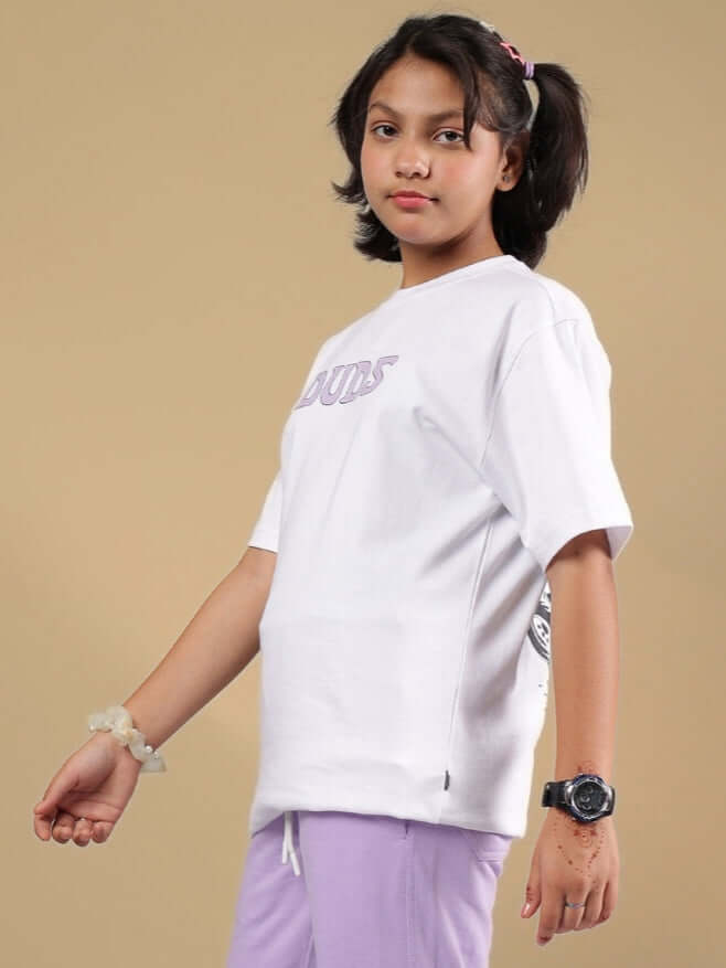 Child wearing white Knight Ryder T-shirt by DUDS, available for boys and girls, customizable fit option, side view