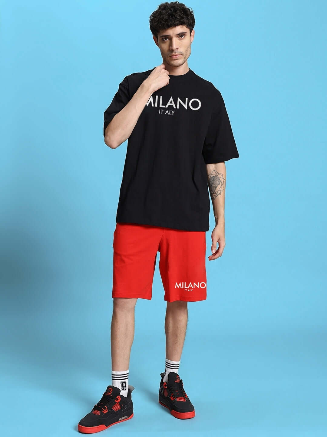 Model wearing ACRO SUMMER CO-ORD SET in black and red with premium heavy gauge fabric, showcasing stylish summer fashion.