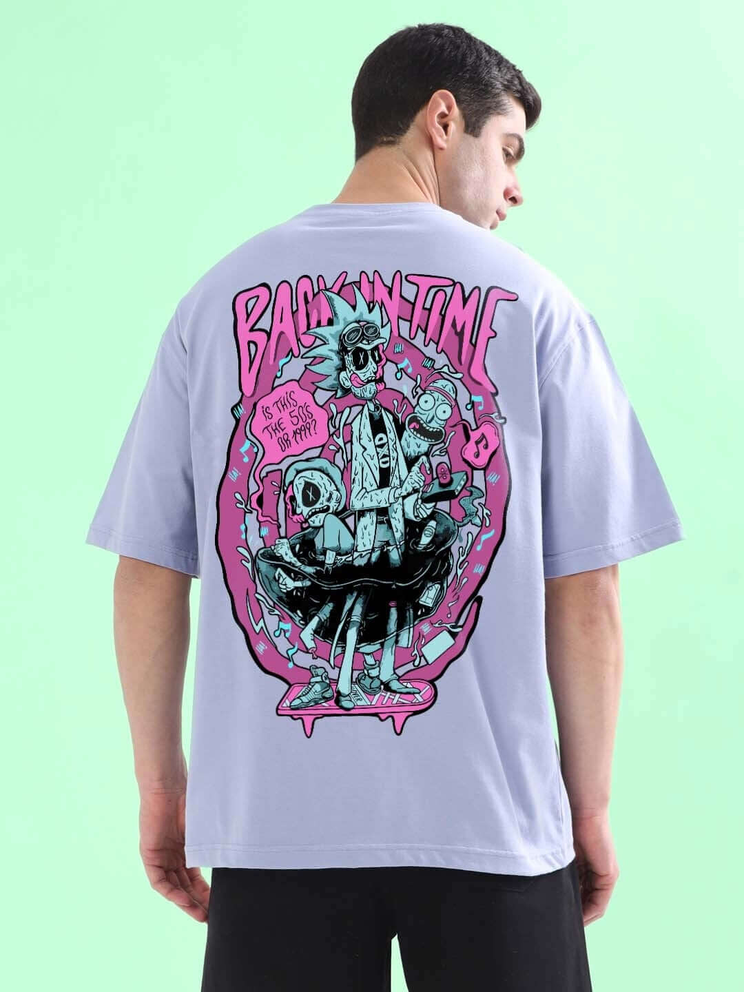 BACK IN TIME OVER-SIZED T-SHIRT LILAC with graphic print, 100% cotton, premium heavy gauge fabric, back view of model wearing t-shirt.